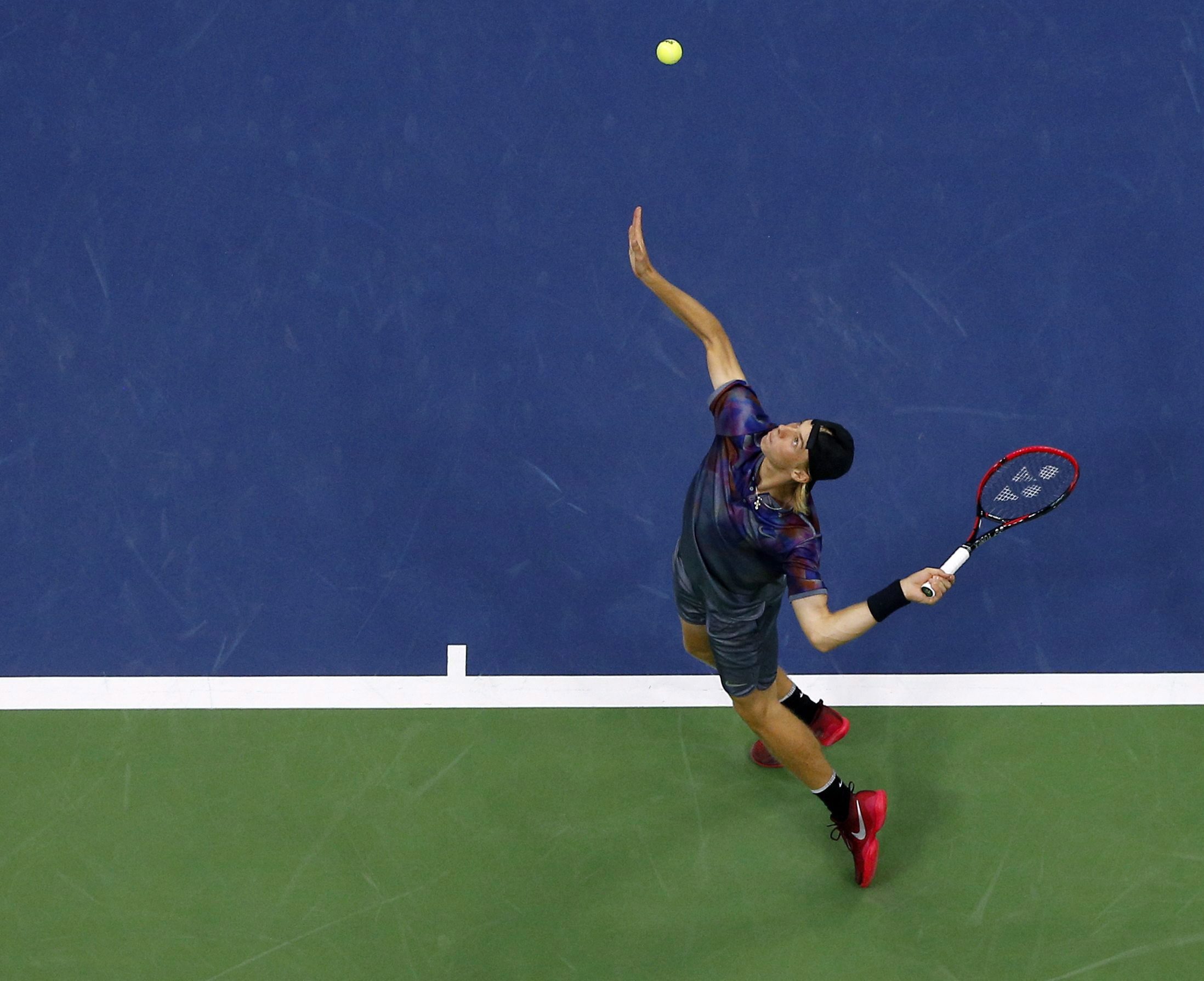 Denis aerial shot of a serve
