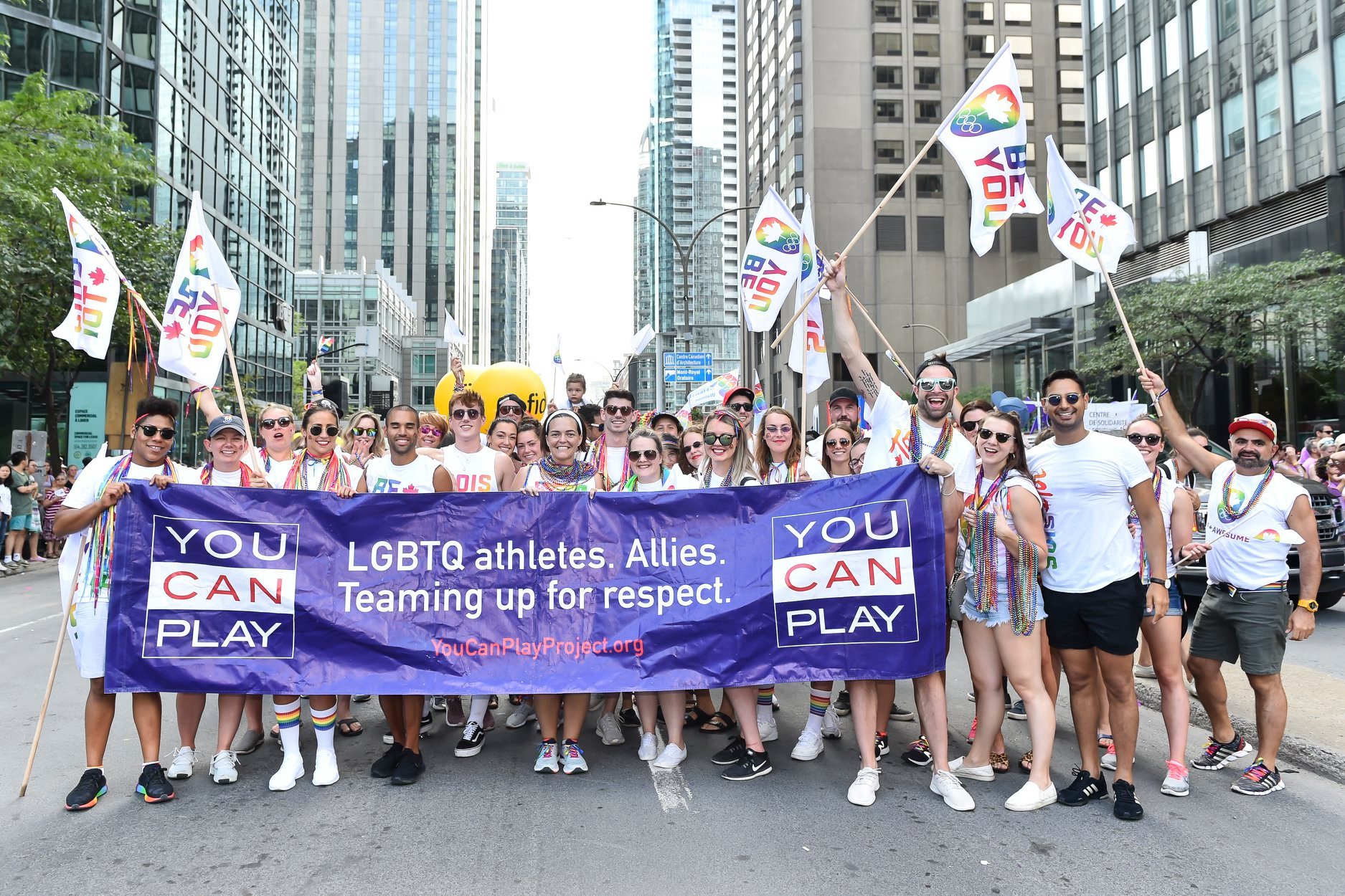 People posing at You Can Play event