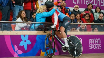 Cyclist hugs people in crowd