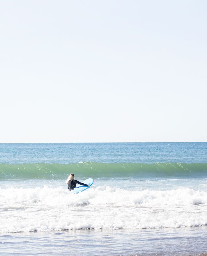 Surfer about to find a wave