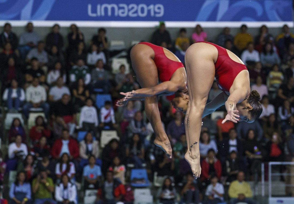 two divers in mid air