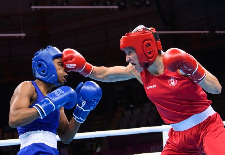 boxer punches another boxer