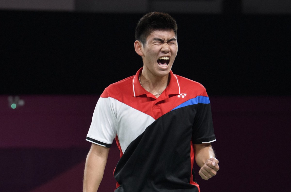 man celebrates