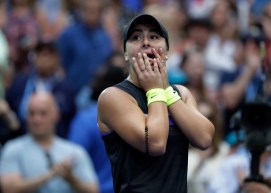 Bianca Andreescu, of Canada, reacts after defeating Serena Williams