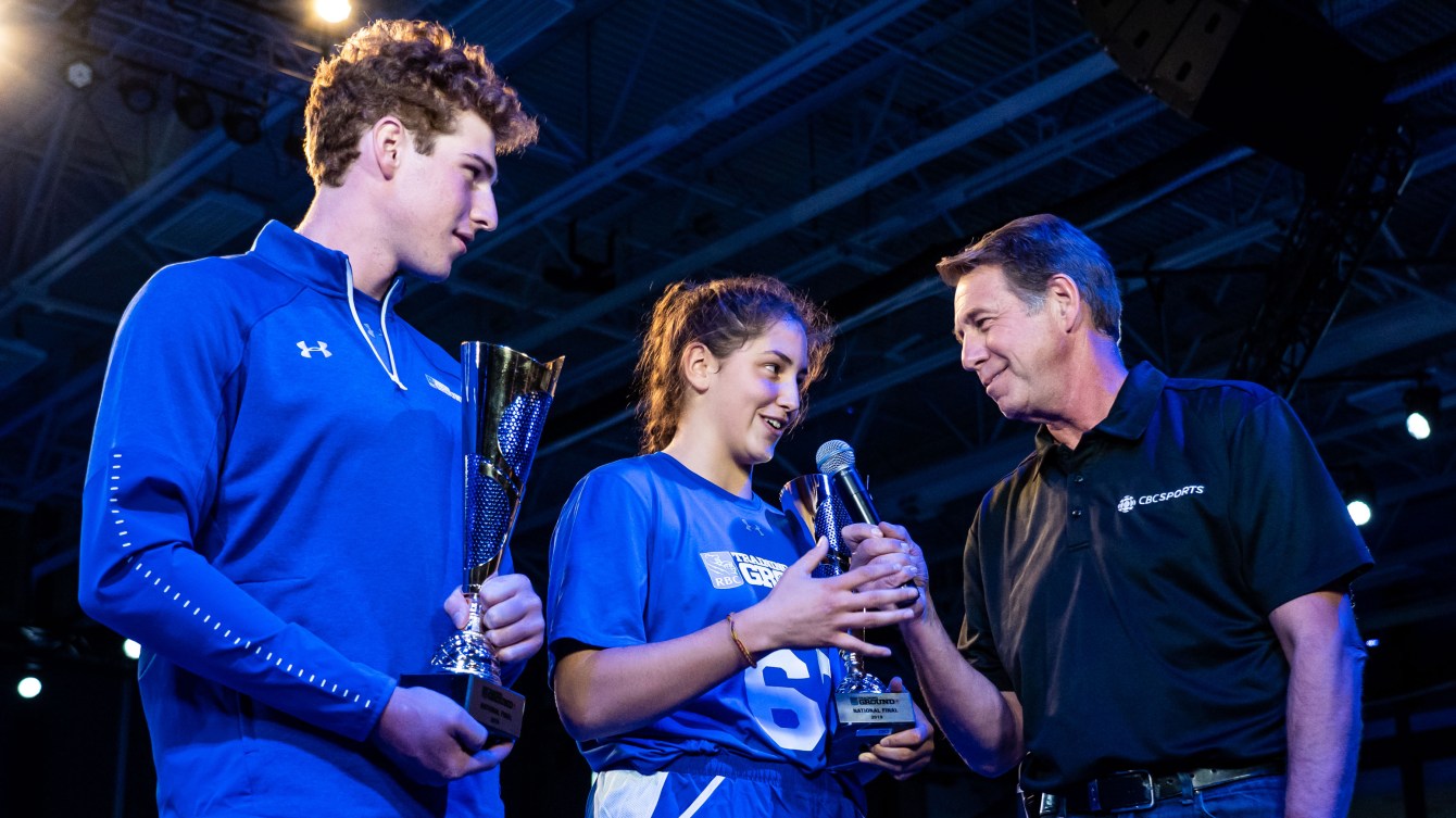 Ian Holmquist (left) and Catherine LIzotte (centre) are interviewed by CBC's Scott Russell .