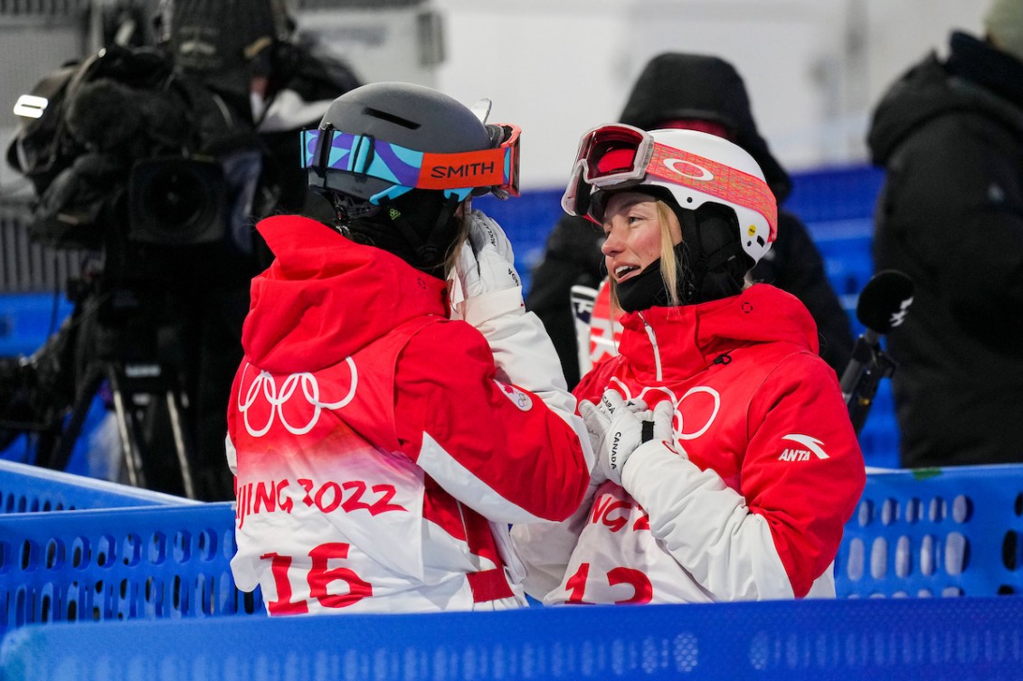Team Canada freestyle skiers Justine and Chloe Dufour-Lapointe competes in the women’s moguls during the Beijing 2022 Olympic Winter Games on Sunday, February 06, 2022. Photo by Darren Calabrese/COC MANDATORY CREDIT
