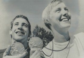 Leslie Cliff, right, holding her Olympic silver medal