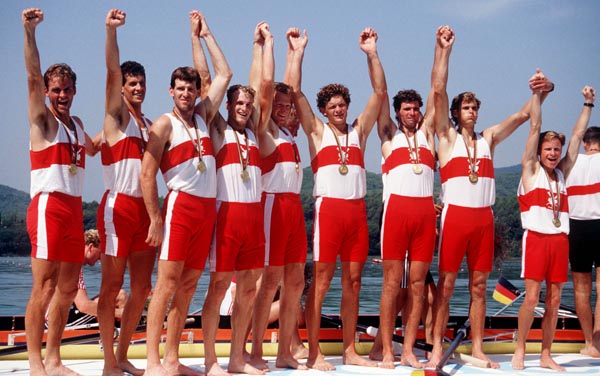 Terry Paul, far right, celebrates a gold medal win with his 8+ rowing team at Barcelona 1992