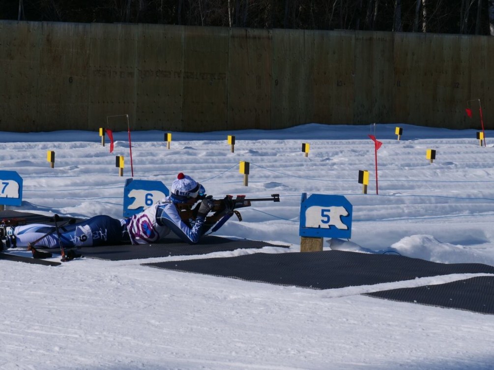 A team Yamal biathlete concentrates on their target at the 2018 Arctic Winter Games.