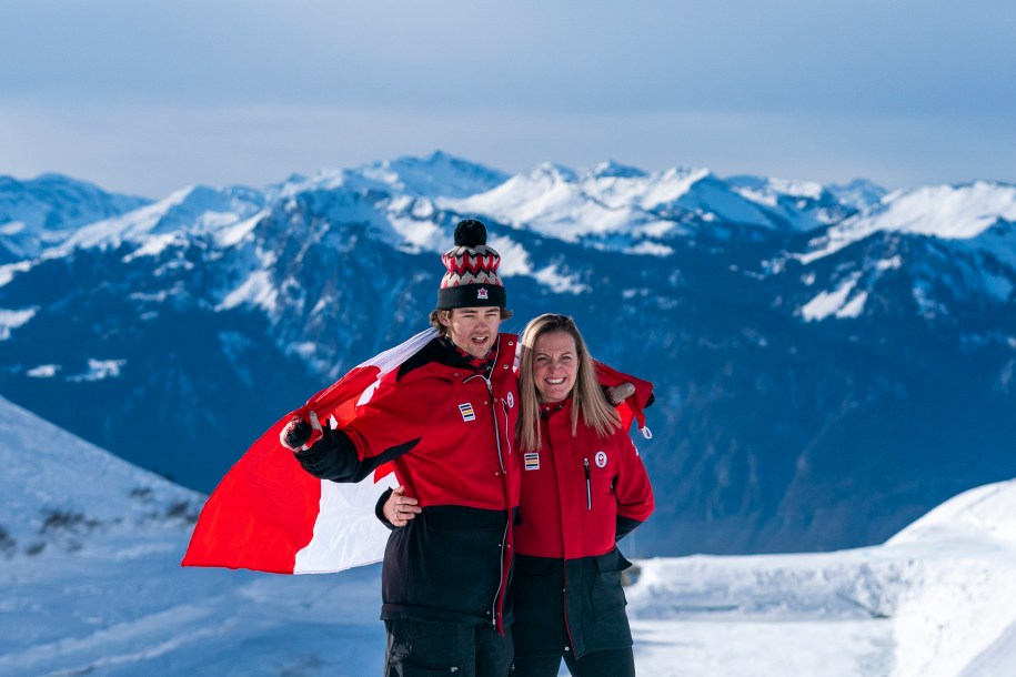 Canadian closing ceremony flag bearer, Andrew Longino and Chef de Misson, Annamay Oldershaw pose with a Canadian flag in Leysin, Switzerland on Wednesday, January 22, 2020 during the Lausanne Youth Olympics.