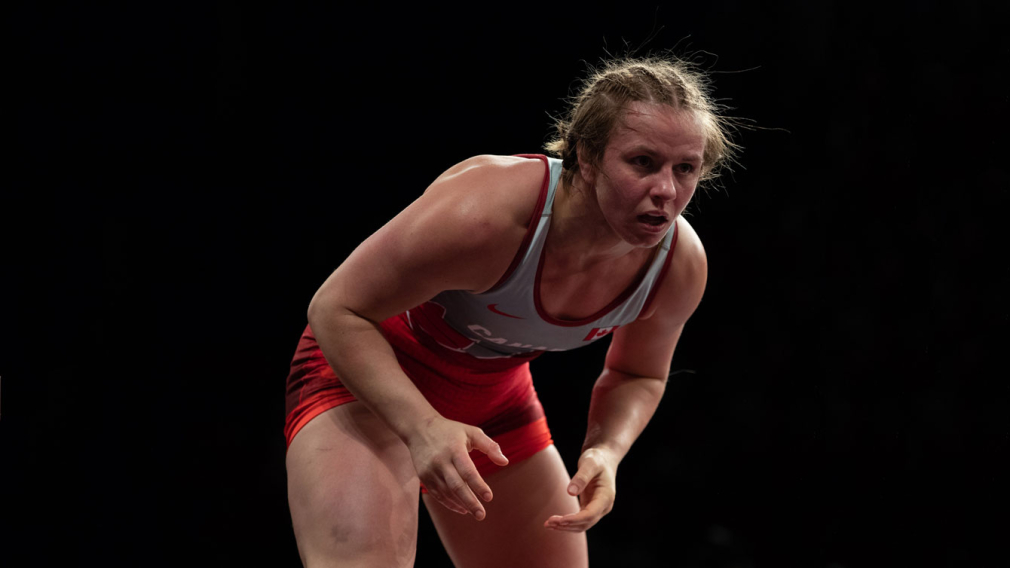 Erica Wiebe gets ready to attack during a wrestling match.