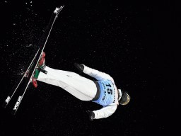 Lewis Irving, of Canada, competes in the men's World Cup freestyle skiing aerials in Lake Placid, N.Y., Saturday, Jan. 20, 2018. (AP Photo/Hans Pennink)