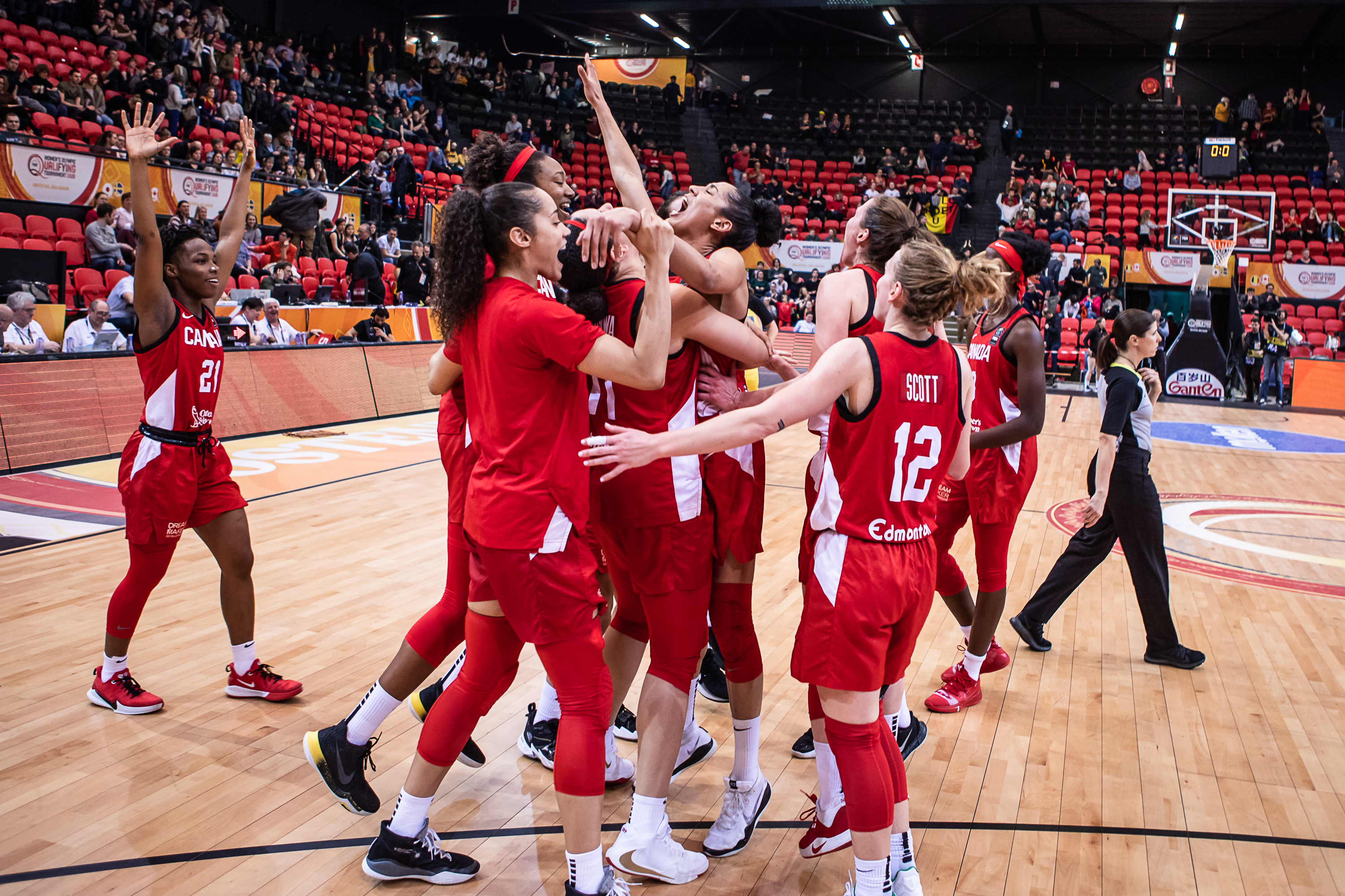 Team Canada basketball players celebrates their win at the FIBA Women's Olympic Qualifying Tournament
