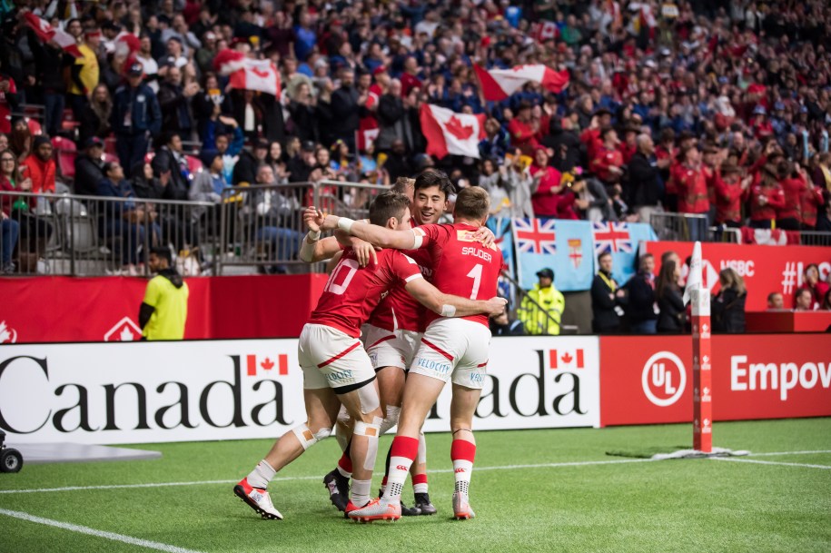 A group of Canadian rugby players celebrate a win