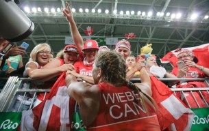 Erica Wiede celebrates with fans at Rio 2016