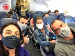 Judo national team members wear masks on airplane