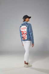 Kylie Masse back to camera in Tokyo 2020 closing ceremony jean jacket