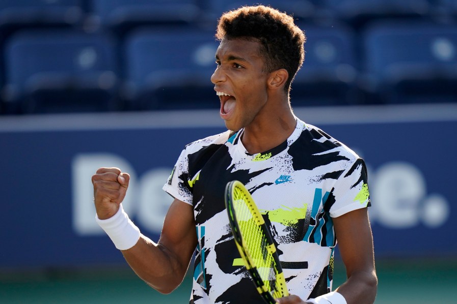 Felix Auger-Aliassime, of Canada, celebrates after winning a match against Corentin Moutet, of France, during the third round of the US Open tennis championships, Saturday, Sept. 5, 2020, in New York. (AP Photo/Frank Franklin II)