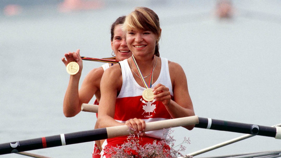 Kathleen Heddle and Marnie McBean celebrate their Olympic medal