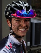 Haley Smith smiling with mud on her face