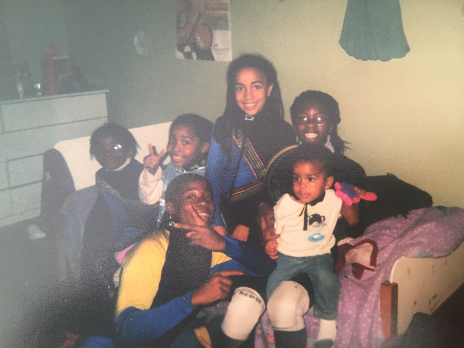 Alyson Charles as a child with her cousins