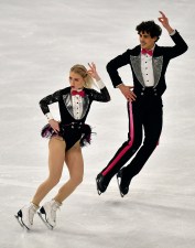 Piper Gilles and Paul Poirier of Canada perform during the Ice Dance - Rhythm Dance at the Figure Skating World Championships in Stockholm, Sweden, Friday, March 26, 2021.