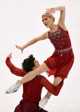 Piper Gilles and Paul Poirier of Canada perform during the Ice Dance-Free Dance at the Figure Skating World Championships in Stockholm, Sweden, Saturday, March 27, 2021.