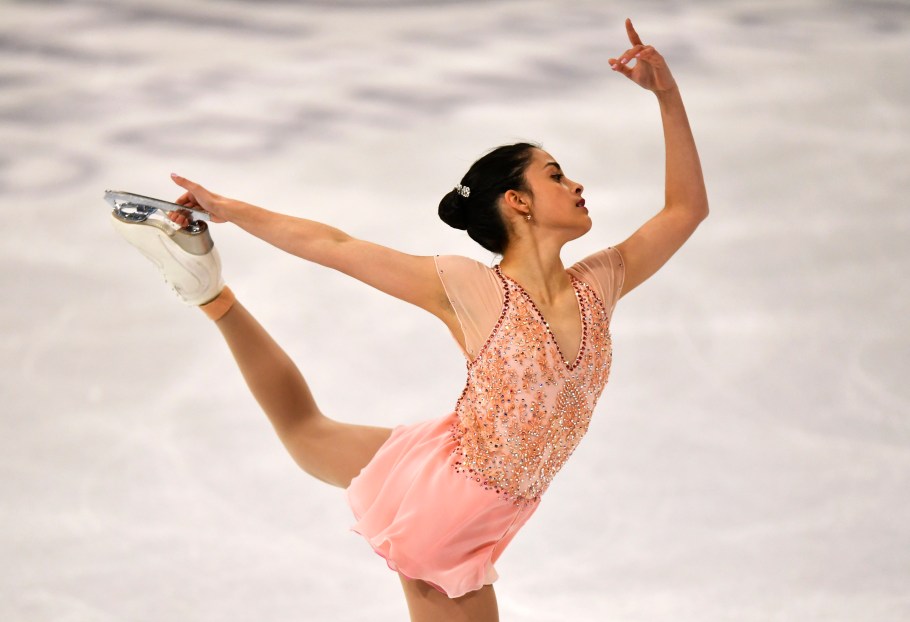 Figure skater performs an arabesque