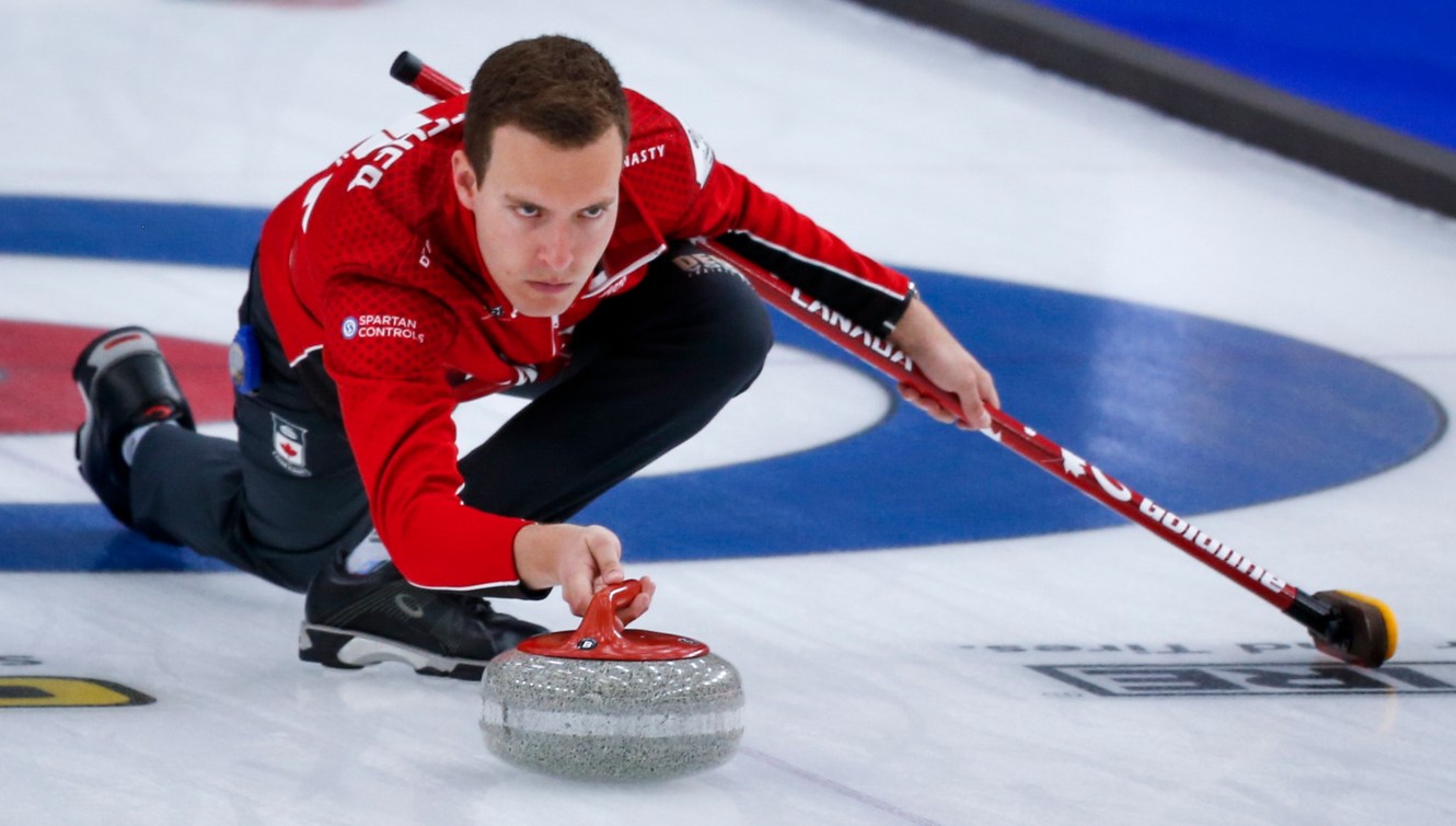 Team Canada skip Brendan Bottcher makes a shot against Switzerland at the Men's World Curling Championships in Calgary, Alta., Sunday, April 4, 2021.