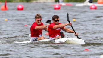 Two male kayakers in their boat