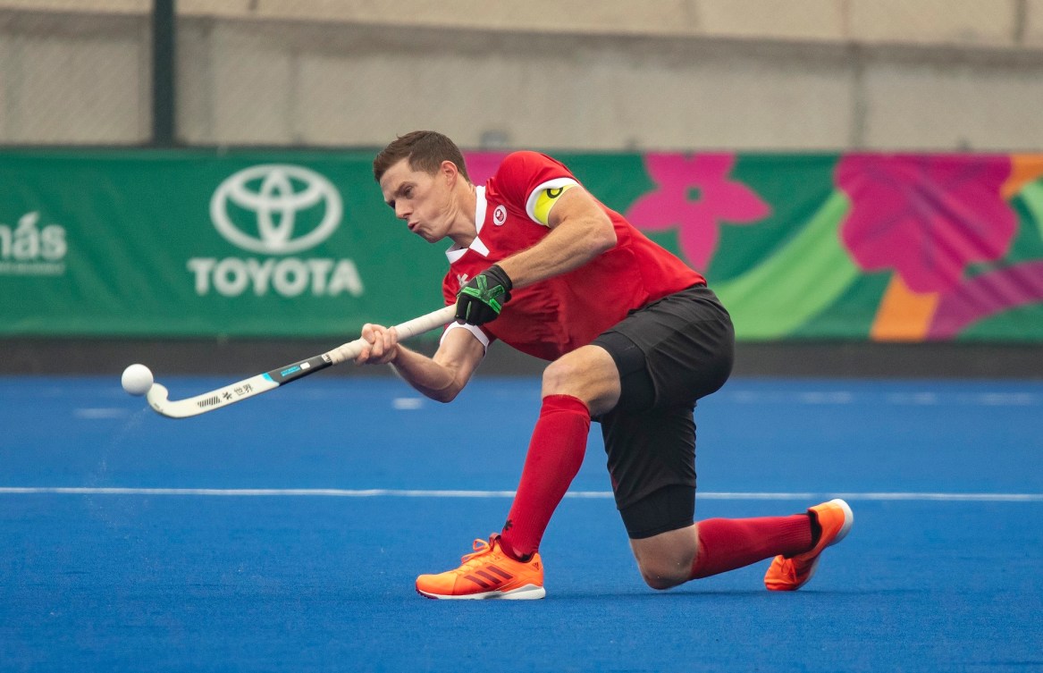 Scott Tupper of Canada plays the ball against the United States in field hockey at the Lima Pan American Games on Aug. 1, 2019. THE CANADIAN PRESS/HO-COC, Andrew Lahodynskyj,