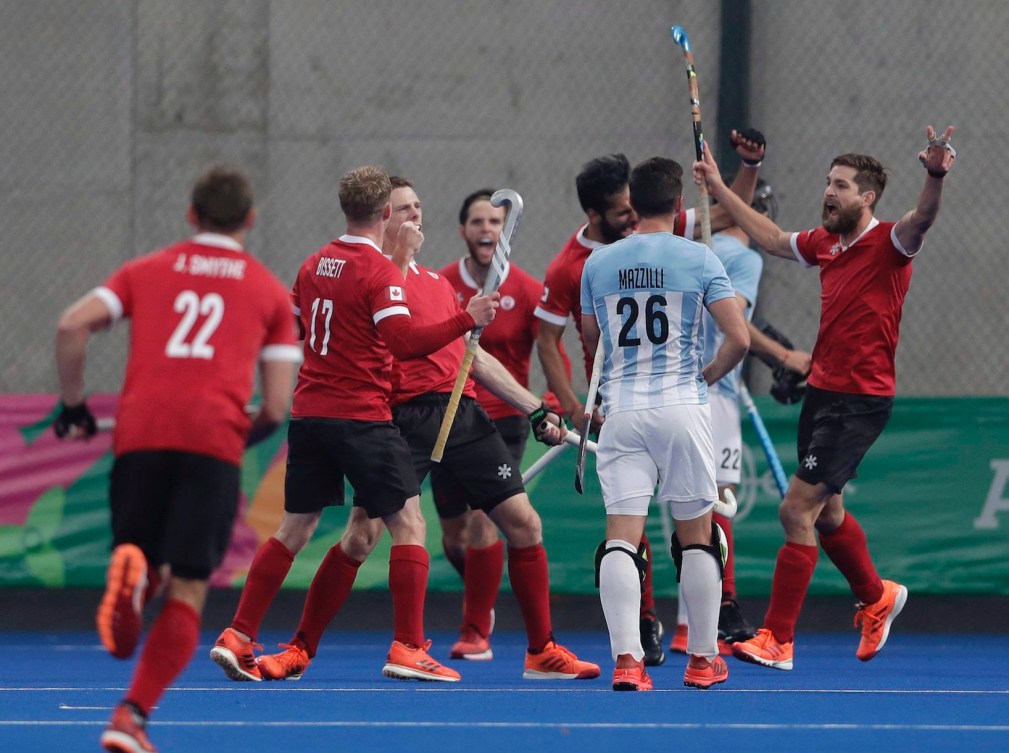 Canada celebrates after they scored their 4th goal against Argentina in the men's field hockey gold medal matchof the Pan American Games in Lima, Peru, Saturday, Aug. 10, 2019. (AP Photo/Silvia Izquierdo)