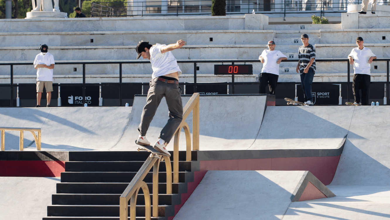 Matt Berger rides a rail on his skateboard