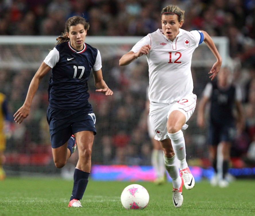 Tobin Heath and Christine Sinclair chasing the ball at London 2012