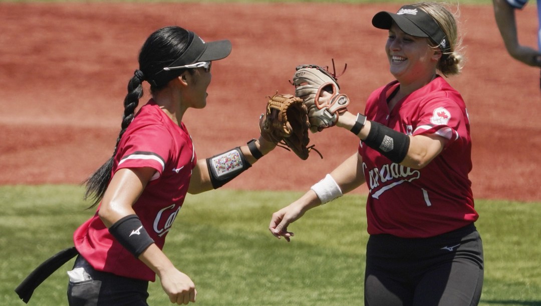 Janet Leung and Kelsey Harshman celebrate