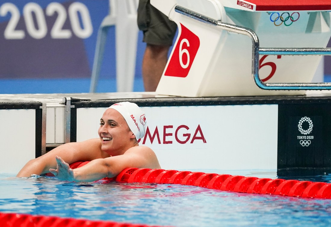 Kylie Masse smiles after winning silver 