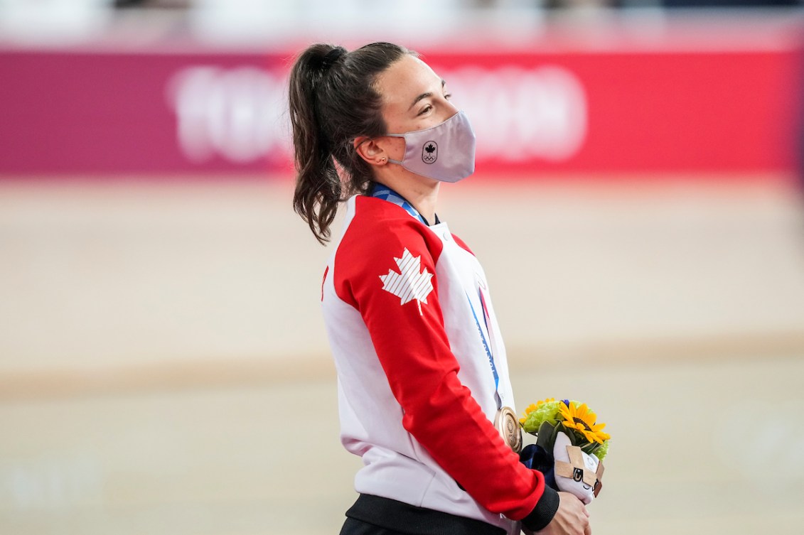 Canadian cyclist Lauriane Genest receiving her bronze medal