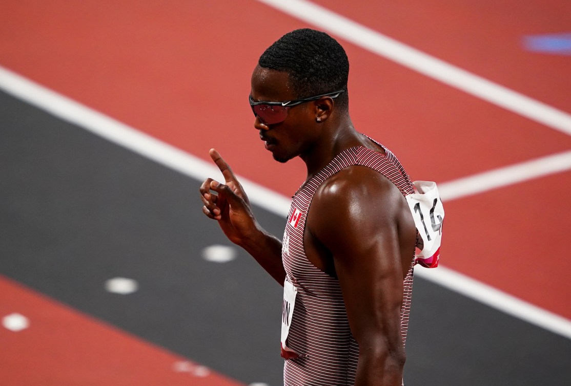 Aaron Brown points his finger as a number one 