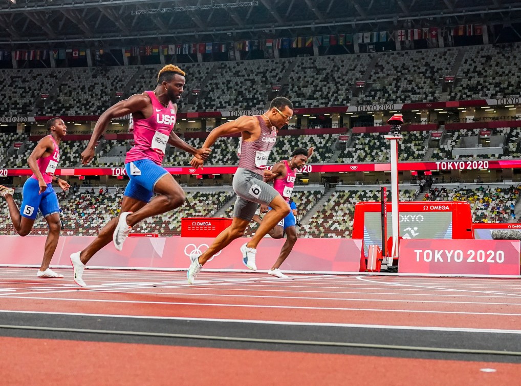 Andre De Grasse crosses the finish line first in the 200m