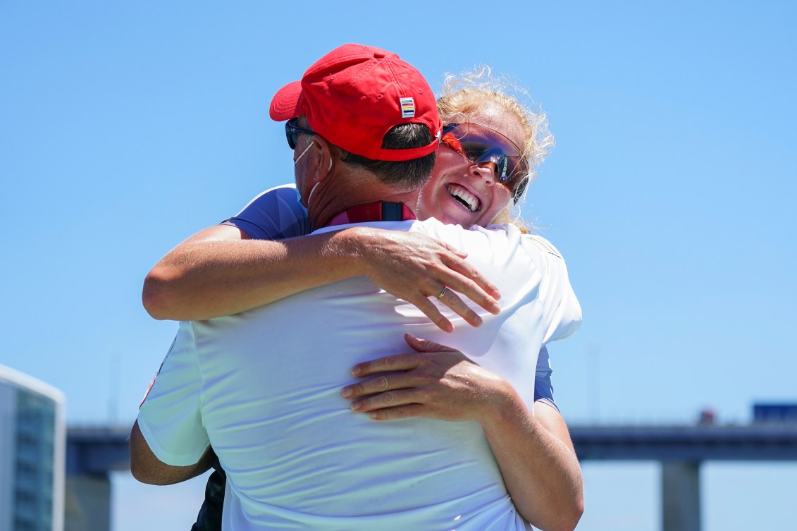 Laurence Vincent Lapointe hugs her coach 