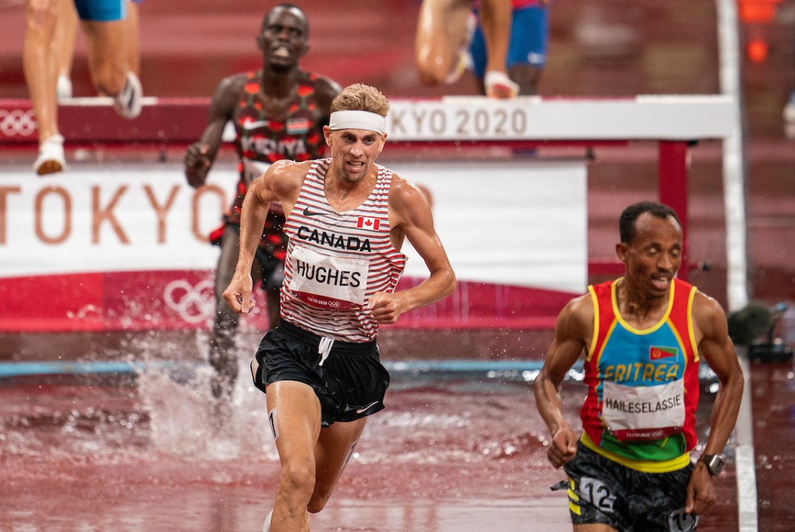 Matt Hughes competes in the men's 3000-metre steeplechase.