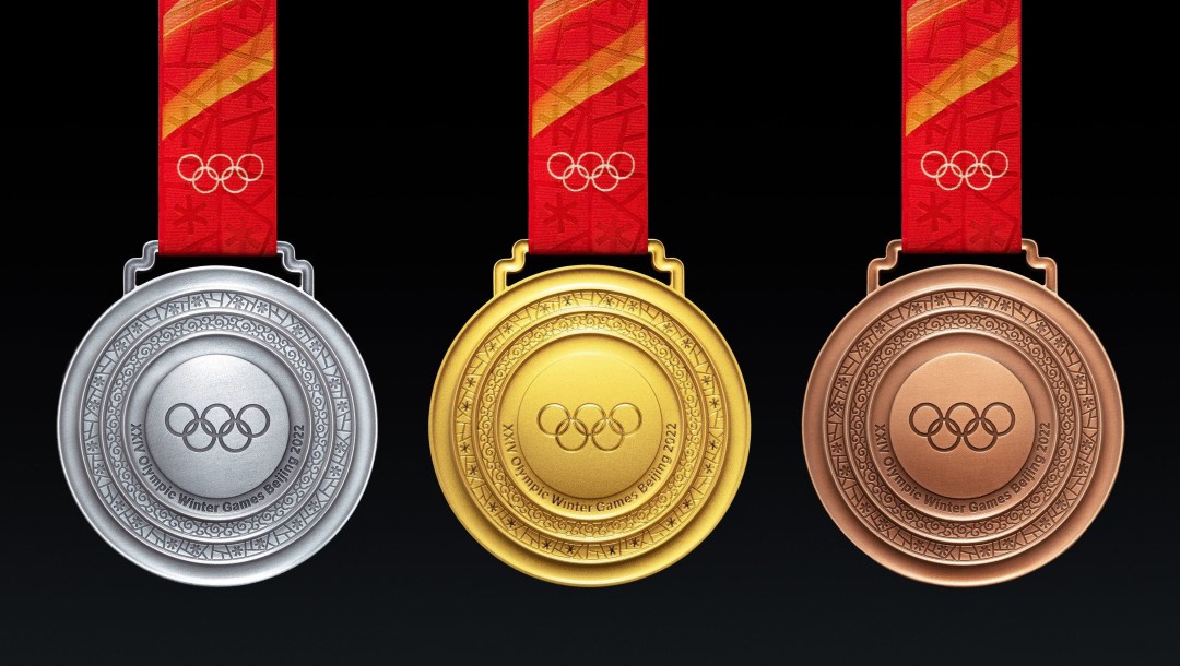 Gold silver and bronze Beijing 2022 medals showing the front view