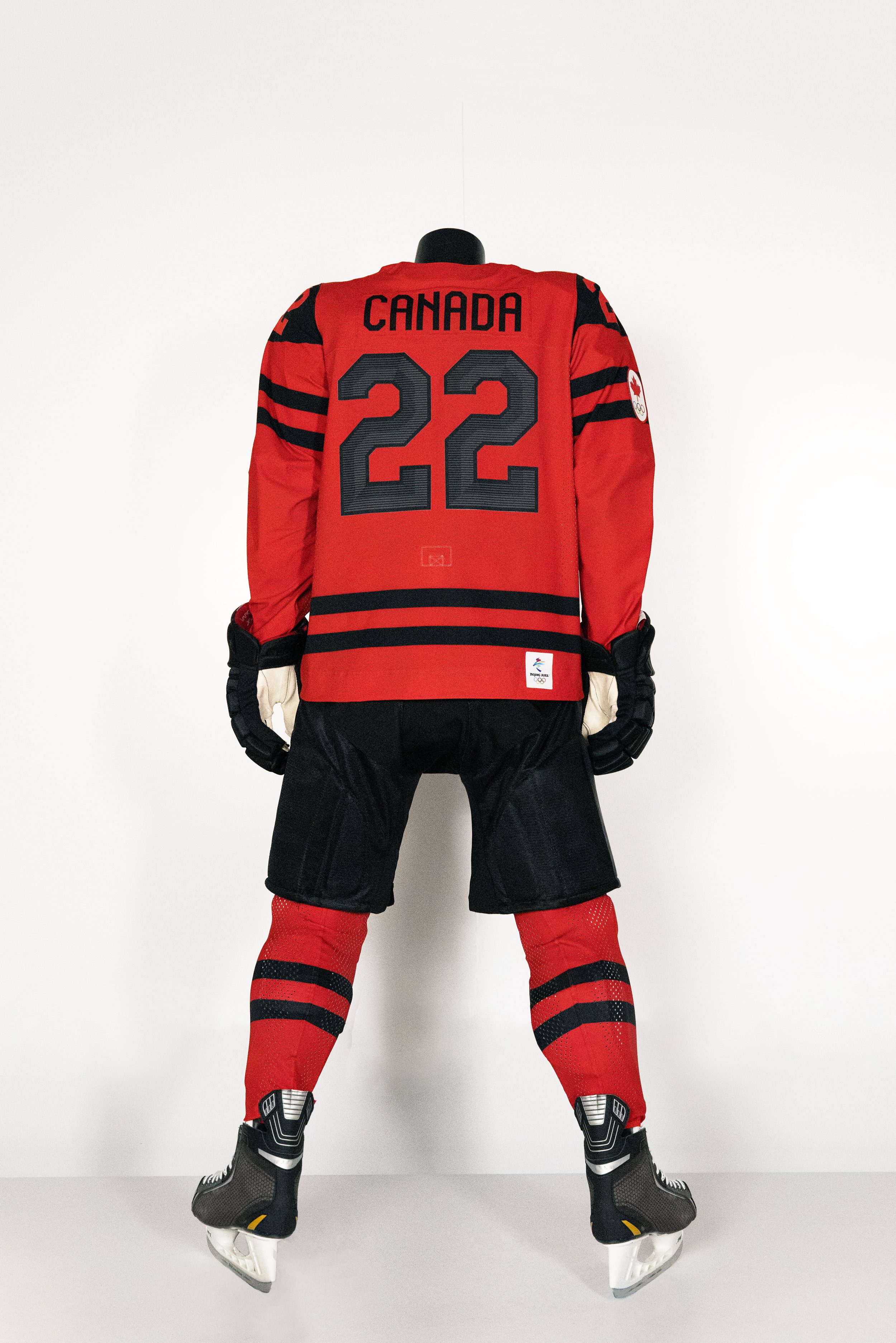 Full length back shot of Team Canada red hockey uniform for Beijing 2022