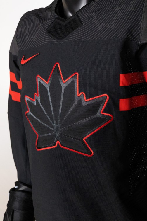 Close up of front of black Team Canada hockey jersey for Beijing 2022