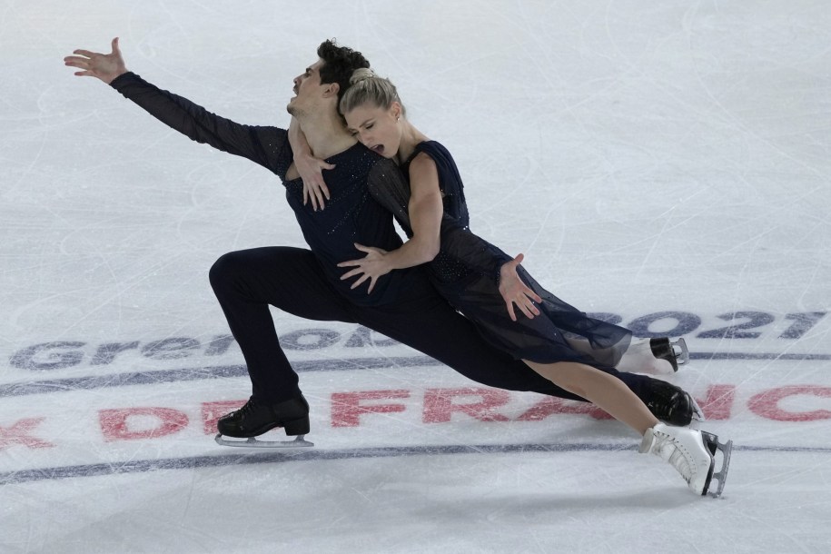Piper Gilles and Paul Poirier of Canada compete in the Ice Dance Free Dance during the ISU figure skating France's Trophy, in Grenoble, French Alps, France, Saturday, Nov. 20, 2021.