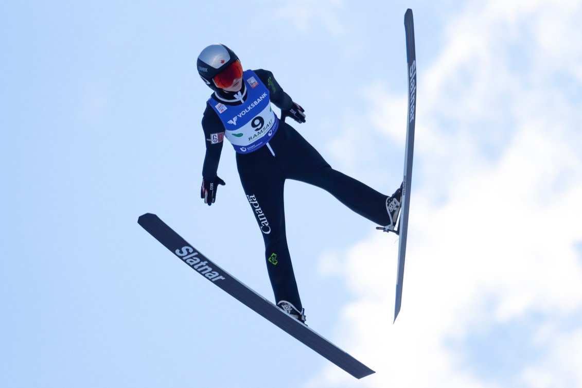 Alexandria Loutitt of Canada soars through the air during the FIS Ski Jumping Women's World Cup in Ramsau, Austria, Friday, Dec. 17, 2021.
