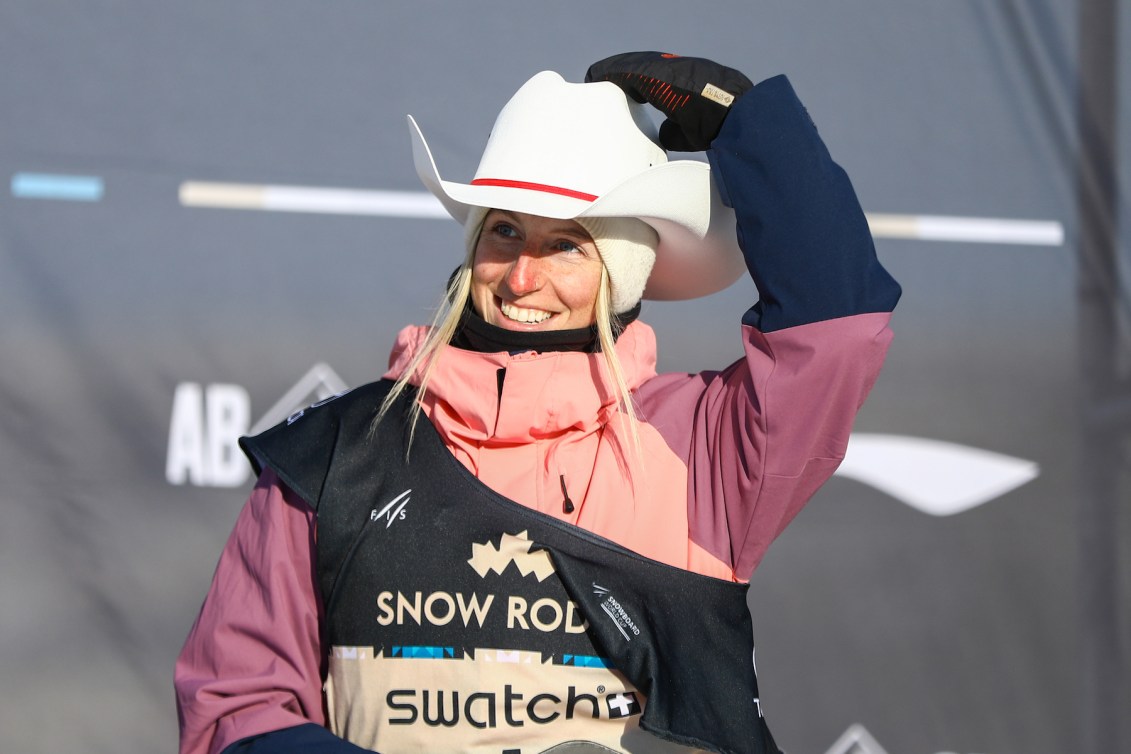 Canada’s Laurie Blouin smiles on the podium after winning bronze in the women's World Cup slopestyle snowboard event in Calgary, Alta., Saturday, Jan. 1, 2022. THE CANADIAN PRESS/Evan Buhler