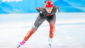 Danae Blais skates towards the camera in a short track race