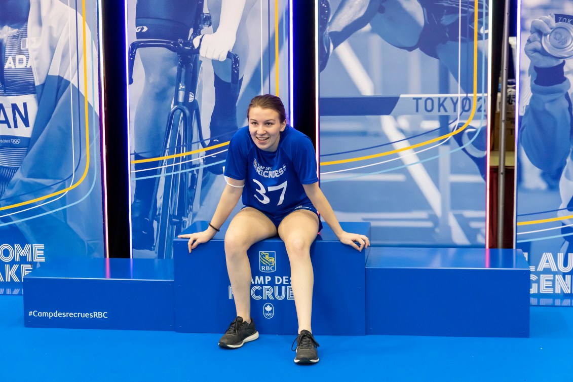 Elodie Caron sitting on podium at RBC Training Ground national final