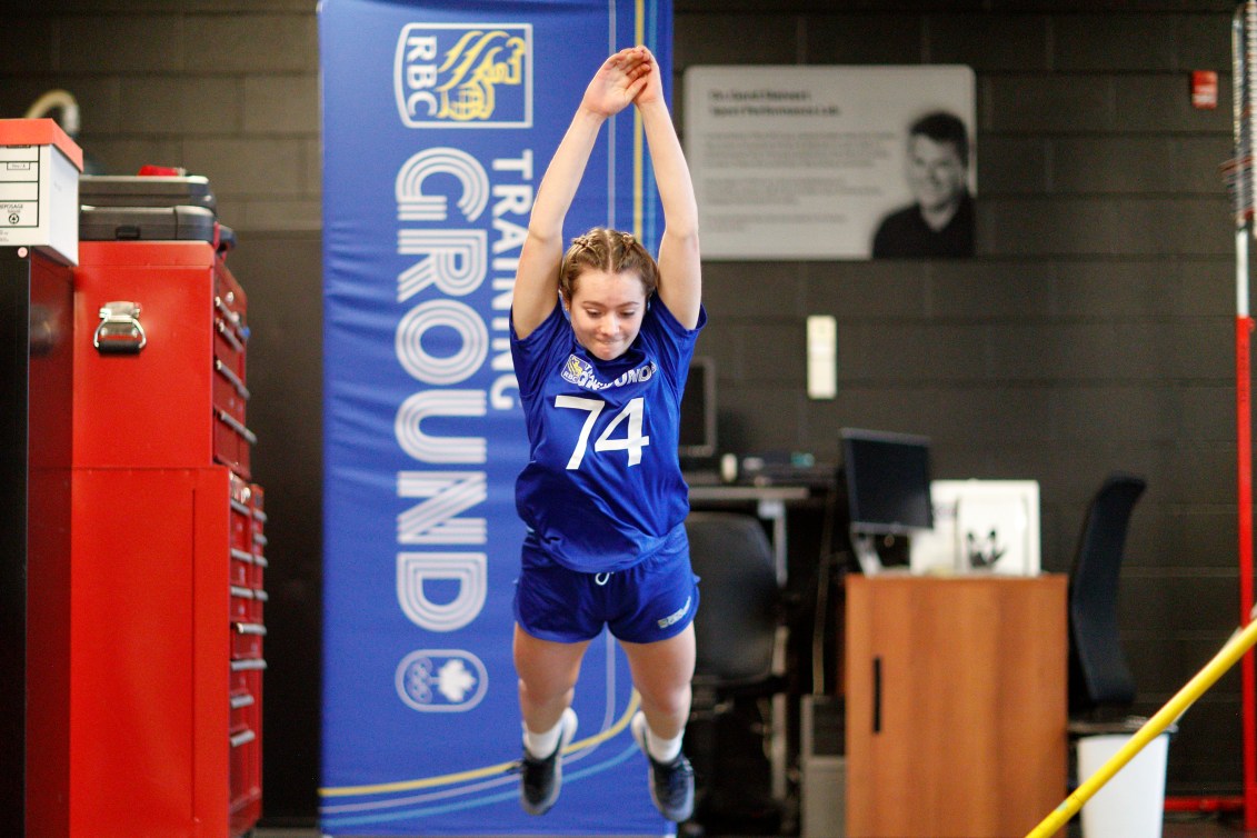 Ava Ference doing long jump at RBC Training Ground testing